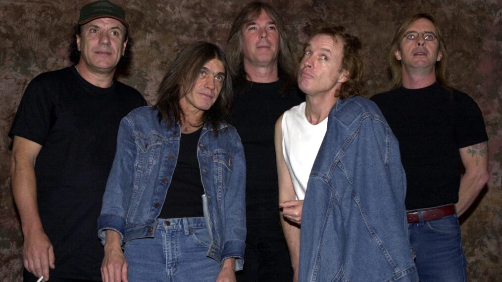 Members of the Australian rock band AC-DC pose for a photograph after the Rock Walk handprint ceremony September 15, 2000 at the Guitar Center in Hollywood, Ca. From left: Brian Johnson, Malcolm Young, Cliff Williams, Angus Young and Phil Rudd