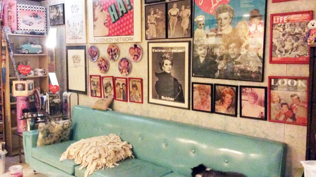 Glen Charlow displays some of his Lucille Ball collection, which includes posters, plates, glossy images and more.