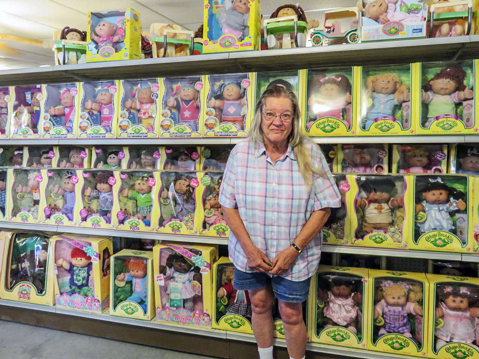 Donna Brown with her collection of Cabbage Patch Kids