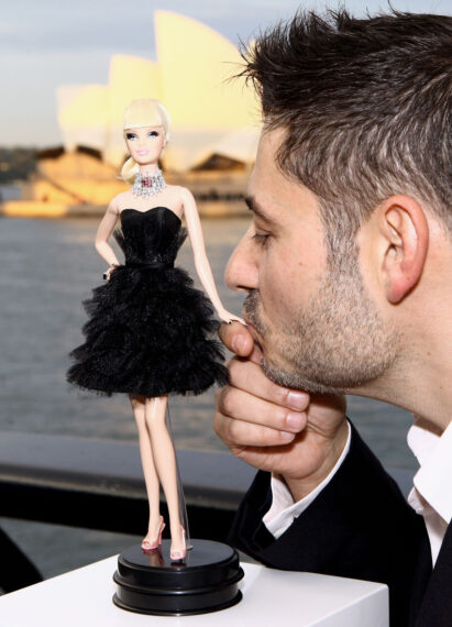 Jewellery designer Stefano Canturi poses with the world's most expensive Barbie doll