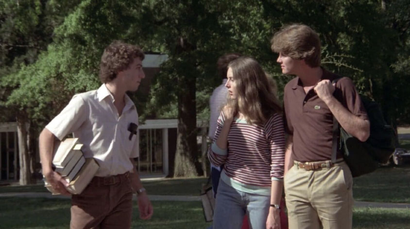 Three characters -- students on a college campus in North Carolina -- talking in a scene from the 1981 slasher movie <i>Final Exam</i>.