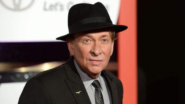 Singer Bobby Caldwell in a hat
