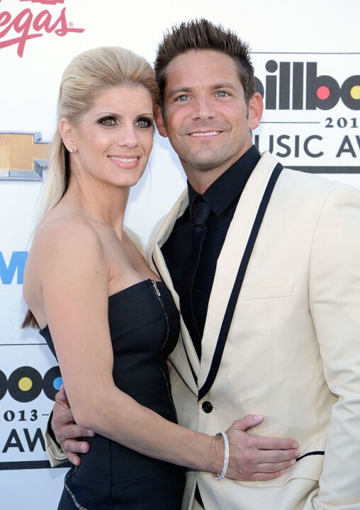 LAS VEGAS, NV - MAY 19: Jeff Timmons of 98 Degrees (R) and Amanda Timmons arrive at the 2013 Billboard Music Awards at the MGM Grand Garden Arena on May 19, 2013 in Las Vegas, Nevada