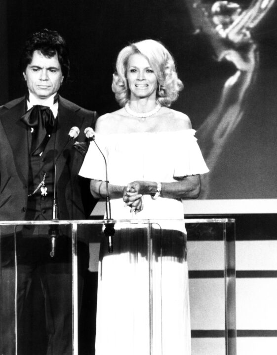 From left: Robert Blake, Angie Dickinson officiating at the Emmy Awards, 1977