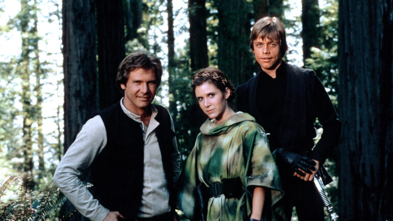 (l-r): Harrison Ford as Han Solo, Carrie Fisher as Leia Organa and Mark Hamill as Luke Skywalker in a posed publicity still from 1983's 