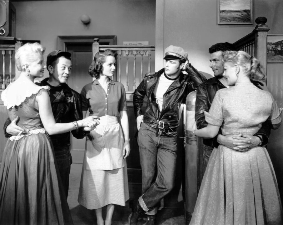 THE WILD ONE, center from left, Mary Murphy, Marlon Brando, 1954
