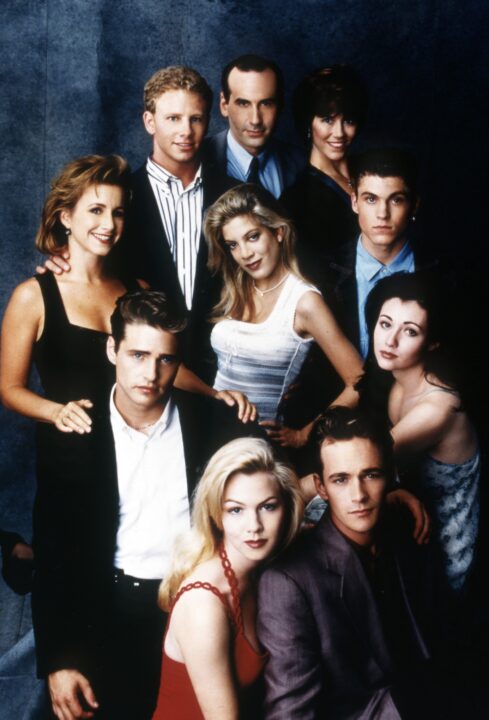 BEVERLY HILLS, 90210, clockwise, from left: Gabrielle Carteris, Ian Ziering, James Eckhouse, Carol Potter, Brian Austin Green, Shannen Doherty, Luke Perry, Jennie Garth (red), Jason Priestley, Tori Spelling, 1993, 1990-2000.