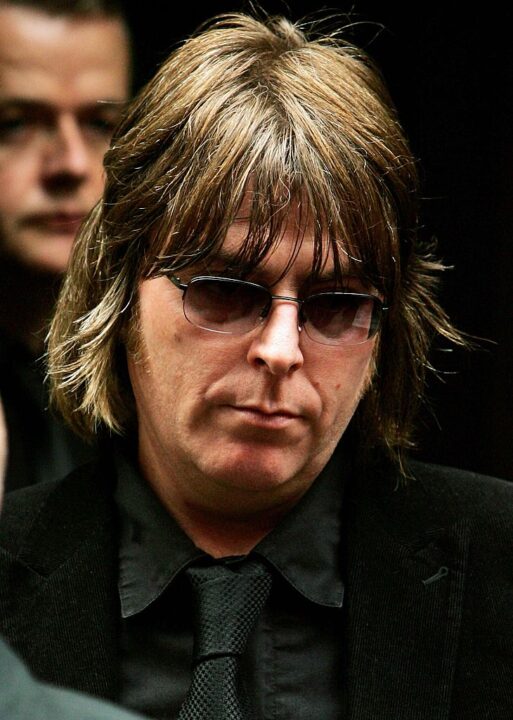 MANCHESTER, UNITED KINGDOM - AUGUST 20: Andy Rourke, formerly of The Smiths, leaves the funeral service of Tony Wilson at the Hidden Gem Church on August 20, 2007 in Manchester, England. The former Factory Records boss, who brought the world Joy Division, New Order and Happy Mondays, was laid to rest after he died of a heart attack on August 10 following a battle with cancer