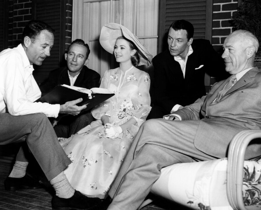 HIGH SOCIETY, from left: director Charles Walters, Bing Crosby, Grace Kelly, Frank Sinatra, producer Sol C. Siegel on set, 1956