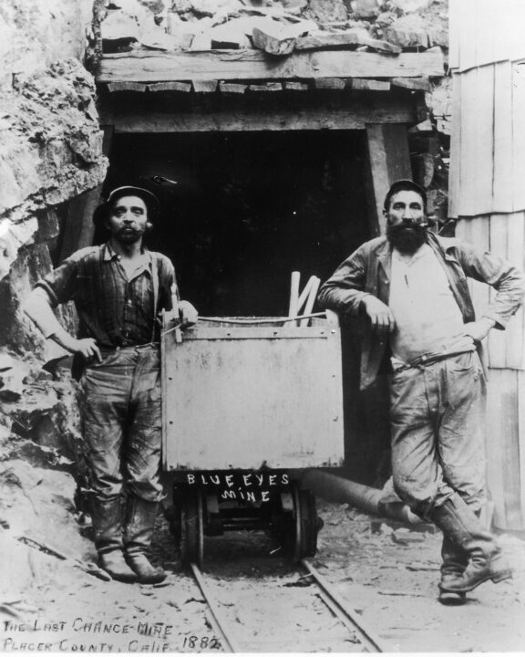 A Photograph of Two Gold Miners Standing Outside of the Last Chance Mine, Wearing Levi Jeans in Placer County, California circa 1882. 