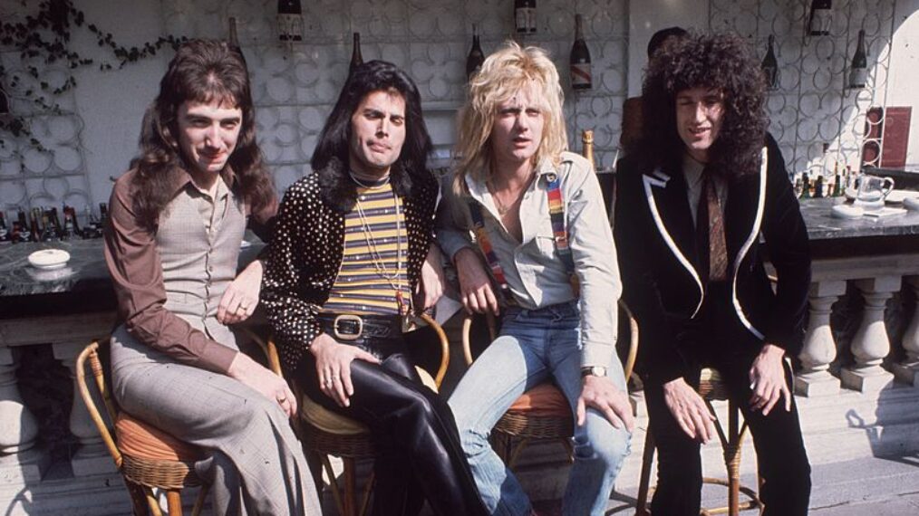 8th September 1976: British rock group Queen at Les Ambassadeurs, where they were presented with silver, gold and platinum discs for sales in excess of one million of their hit single 'Bohemian Rhapsody'. The band are, from left to right, John Deacon, Freddie Mercury (Frederick Bulsara, 1946 - 1991), Roger Taylor and Brian May.