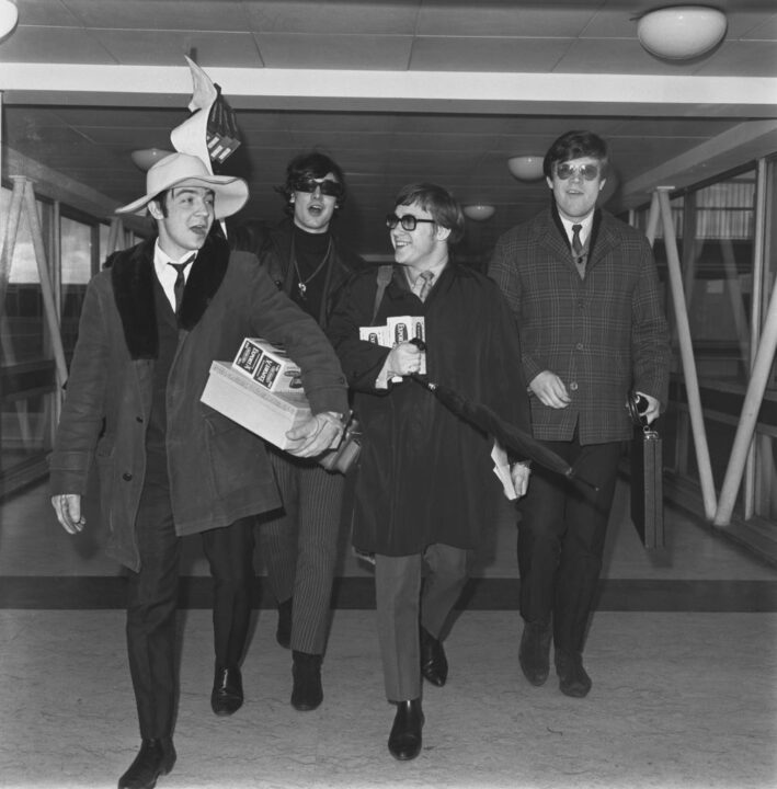 Canadian rock band The Guess Who at Heathrow Airport, London, UK, February 1967. They are carrying boxes of Export A cigarettes. The band are Randy Bachman, Burton Cummings, Jim Kale and Garry Peterson.