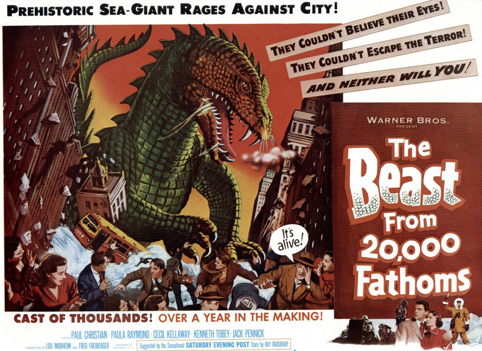 Movie poster for "The Beast From 20,000 Fathoms" (1953). It is a horizontal poster, taken up primarily by the illustration of a gigantic, green, scaled dinosaur destroying buildings and cars on a rampage through New York City as various people flee in its wake (a word balloon coming from one of these people reads "It's Alive!" Words across the top of the poster read" "Prehistoric Sea-Giant Rages Against City!" Reading across the poster below the illustration are the words: "Cast of Thousands! Over a Year in the Making!" Running down the right side of the poster reads "Warner Bros. Present" and below that, in a larger font, the title of the movie.