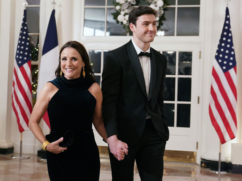 WASHINGTON, DC - DECEMBER 01: Actress Julia Louis-Dreyfus and her son Charlie Hall arrive for the White House state dinner for French President Emmanuel Macron at the White House on December 1, 2022 in Washington, DC. The official state visit is the first of the Biden administration. 