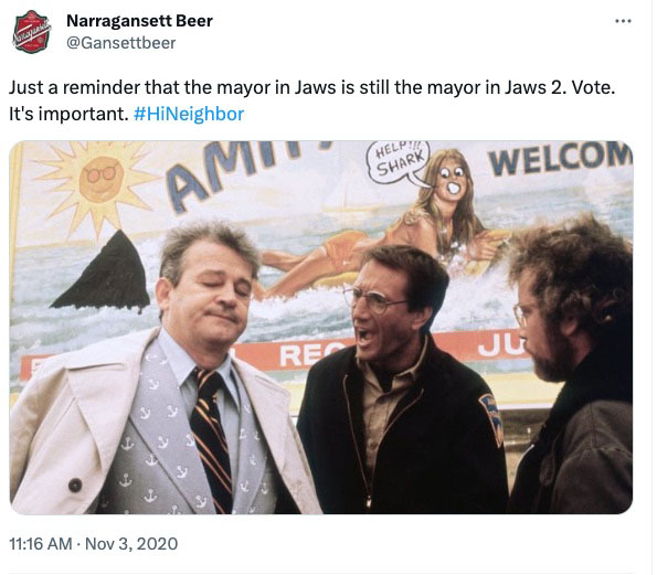 screenshot of a 2020 Twitter post representing a popular social media meme. There is an image from the movie "Jaws" depicting Chief Brody and Hooper arguing with Amity Mayor Vaughn about the need to close the beaches because of the killer shark, with Vaughn looking unimpressed by their pleas. The text above the image reads: "Just a reminder that the mayor in Jaws is still the mayor in Jaws 2. Vote. It's important." 
