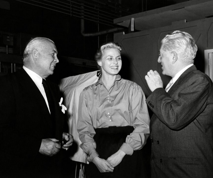 ANASTASIA, from left, producer Spyros Skouras, Ingrid Bergman, director Anatole Litvak, on-set, 1956. 