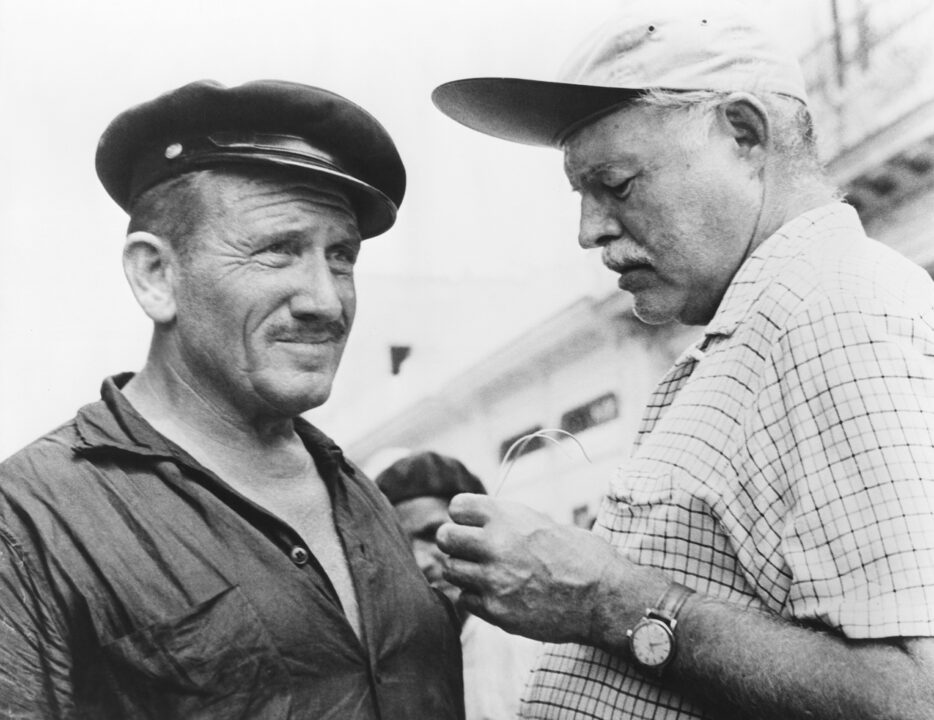 THE OLD MAN AND THE SEA, from left: Spencer Tracy, author Ernest Hemingway