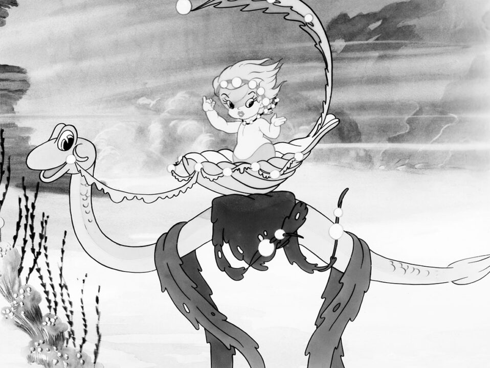 a still from the 1938 Disney animated short "Merbabies." It depicts one of the titular characters, a baby-like person living under the sea, who is riding a snakelike sea creature with a friendly, smiling face like a horse.