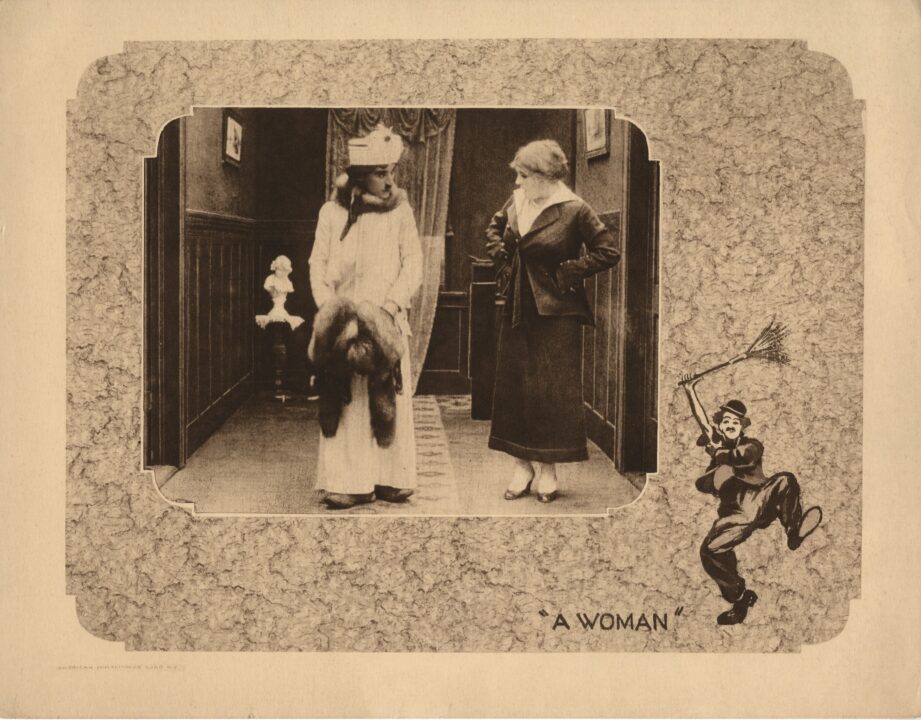 A WOMAN, from left: Edna Purviance, Charlie Chaplin, 1915.