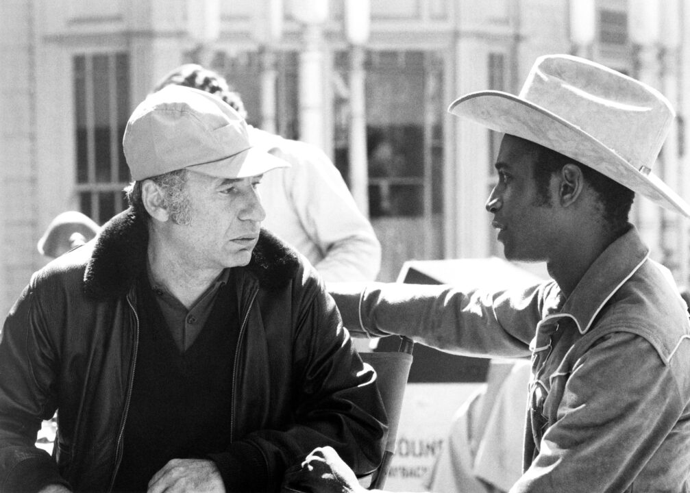 BLAZING SADDLES, from left, director and screenwriter Mel Brooks, Cleavon Little, on-set, 1974