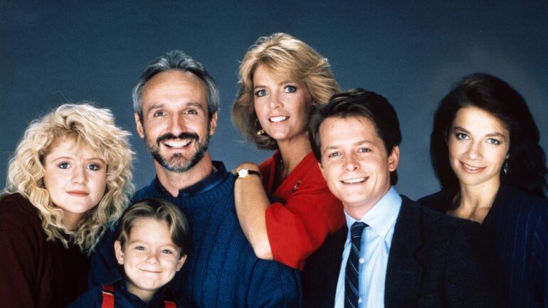 FAMILY TIES, from left: Tina Yothers, Brian Bonsall, Michael Gross, Meredith Baxter, Michael J. Fox, Justine Bateman, 1982-89.