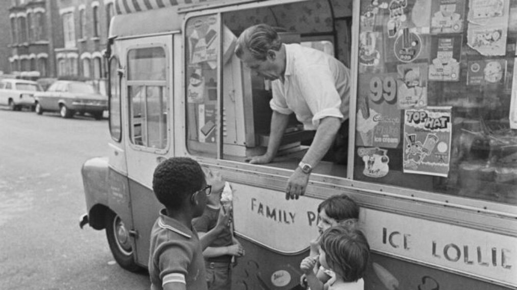 Kids gather around 'Mr Vuoto' Ice Cream Van on a summer day, London, UK, 30th June 1976