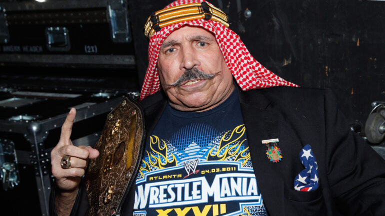 ATLANTA, GA - DECEMBER 11: Iron Sheik poses backstage at Power 96.1's Jingle Ball 2013 at Philips Arena on December 11, 2013 in Atlanta, Georgia.