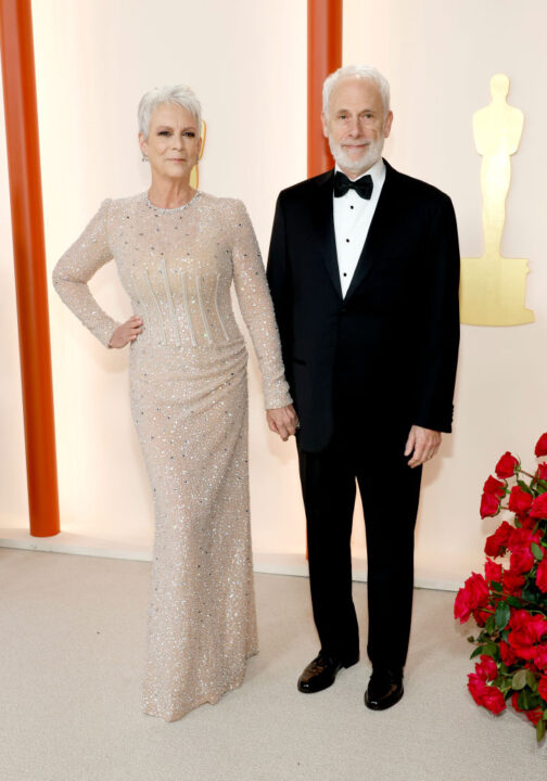 HOLLYWOOD, CALIFORNIA - MARCH 12: (L-R) Jamie Lee Curtis and Christopher Guest attends the 95th Annual Academy Awards on March 12, 2023 in Hollywood, California