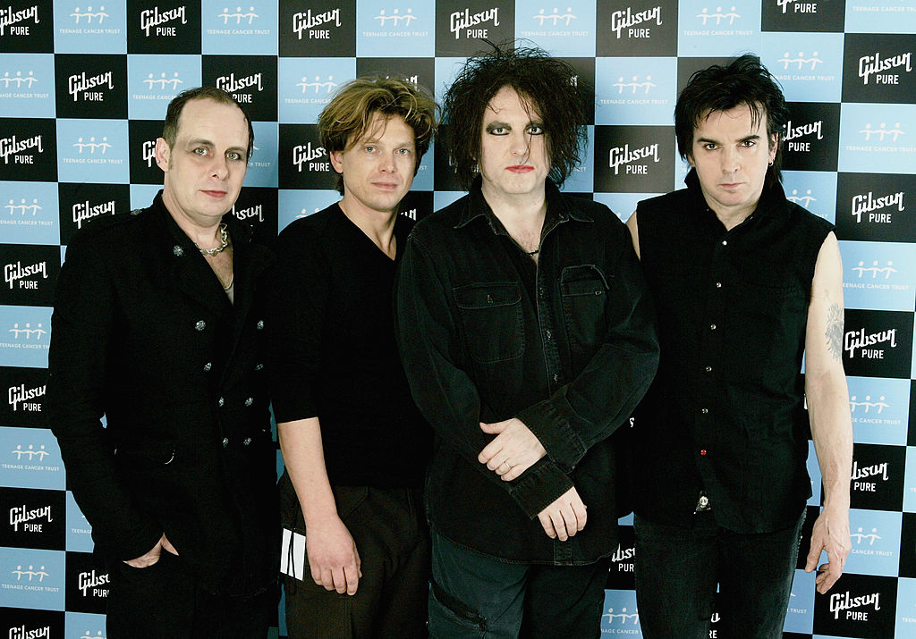 LONDON - APRIL 01: (L-R) Porl Thompson, Jason Cooper, Robert Smith and Simon Gallup of The Cure pose backstage on the sixth and final night of a series of concerts and events in aid of Teenage Cancer Trust organised by charity Patron Roger Daltrey, at the Royal Albert Hall on April 1, 2006 in London, England