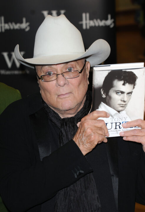 LONDON - OCTOBER 21: Tony Curtis poses at the signing of his book 'Tony Curtis American Prince: My Autobiography' at Harrods on October 21, 2008 in London, England.