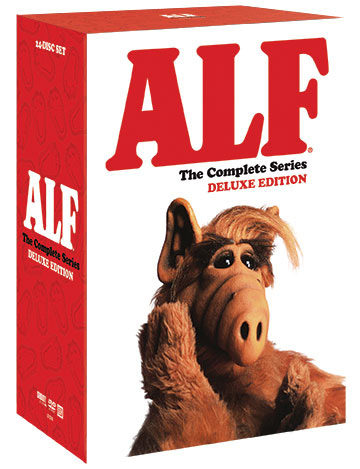 image of the box for Shout! Factory's "ALF: The Complete Series Deluxe Edition" DVD collection. The box is angled so we can see the front, facing right, which has ALF the furry brown alien, seen from the next up, resting his cheek on his right palm. He is against a white background, an above him, in red lettering, is the title of the collection. We can also see a bit of the box's side, which has the title in white against a red backdrop, and also indicates this is a 24-disc set.