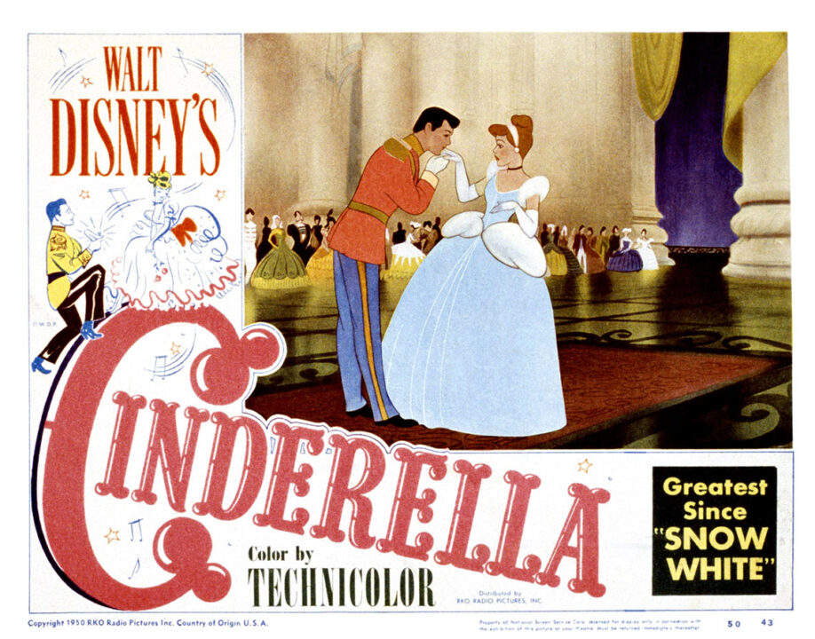 poster art for the 1950 Disney animated feature "Cinderella." It is a horizontal poster. Taking up most of the upper right hand side is a scene from the movie depicting the prince kissing Cinderella's gloved hand on the dance floor of the ball. He is dressed in a royal military style uniform; she is wearing a blue gown with white gloves. At the top of the left, in mid-size red lettering, reads "Walt Disney's" and then, in larger red lettering beginning slightly below that and running diagonally down toward the right, is the title "Cinderella." At the bottom right, in a black box, in yellow lettering reads: "Greatest Since Snow White"