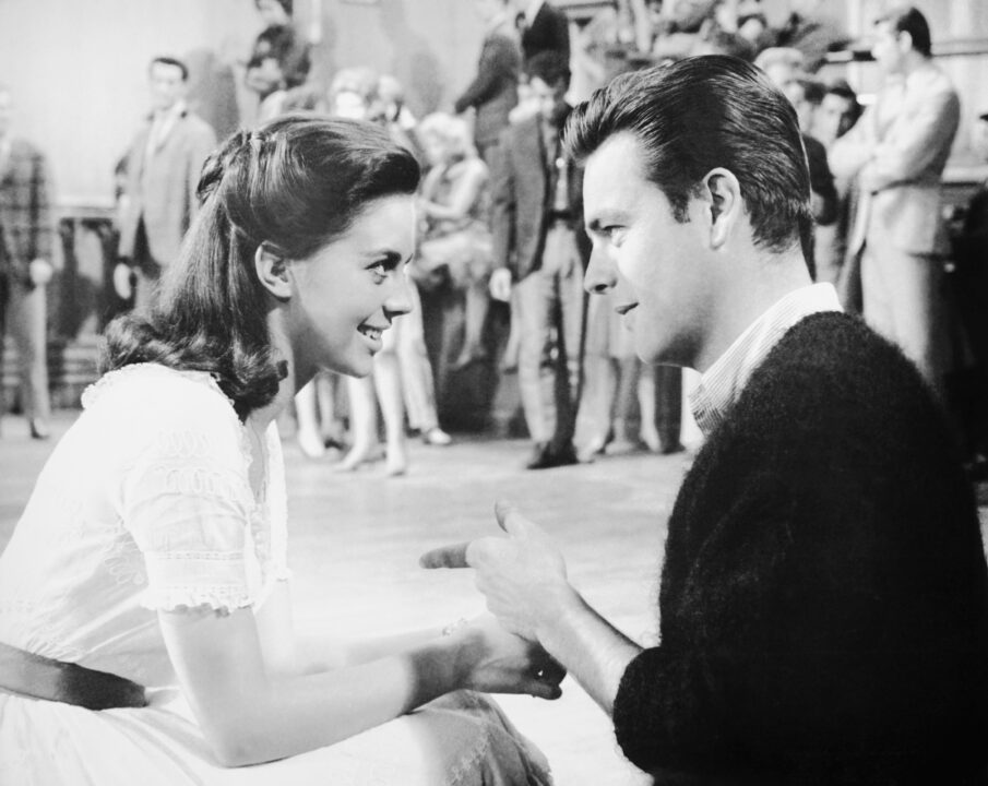 WEST SIDE STORY, from left: Natalie Wood visited by Robert Wagner on set, 1961