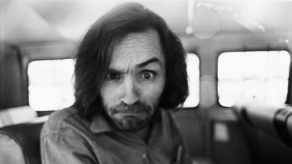American criminal and cult leader Charles Manson (1934 - 2017) traveling on a police van to the Santa Monica Courthouse to appear in court for a hearing regarding the murder of music teacher Gary Hinman, Los Angeles, California, 25th June 1970.