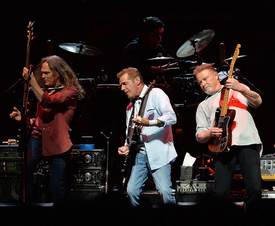 NASHVILLE, TN - OCTOBER 16: Timothy B. Schmit, Glen Frey and Don Henley of the Eagles perform during "History Of The Eagles Live In Concert" at the Bridgestone Arena on October 16, 2013 in Nashville, Tennessee