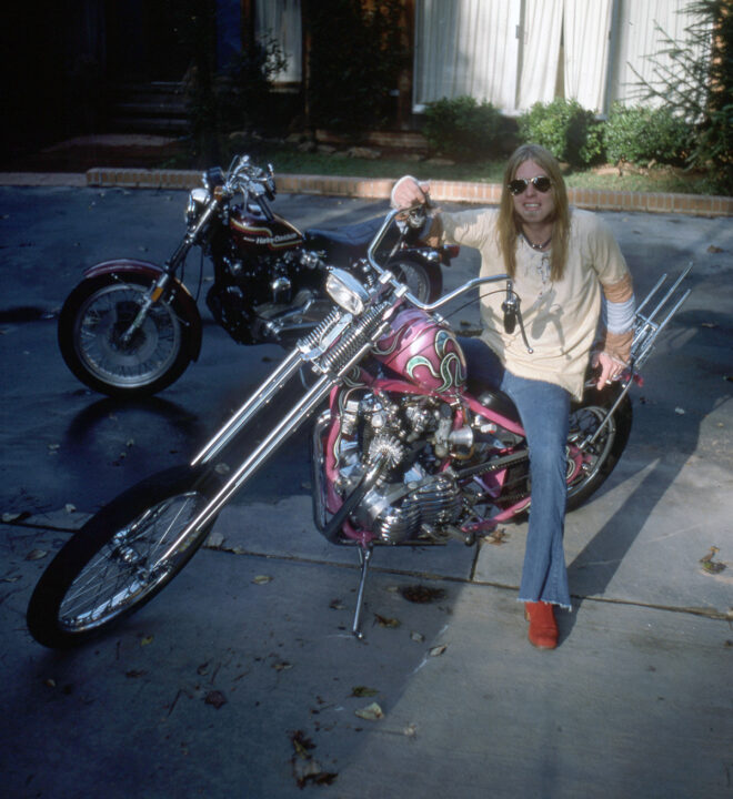 MACON - 1977: American singer, songwriter, musician and founding member and leader of The Allman Brothers Band, Gregg Allman (1947-2017), at home on his custom chopper, circa 1977 in Macon, GA. 