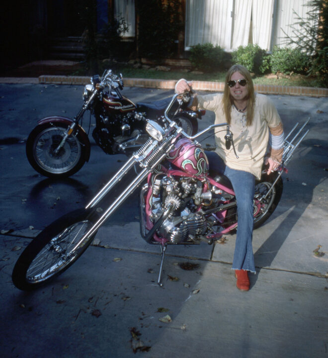MACON - 1977: American singer, songwriter, musician and founding member and leader of The Allman Brothers Band, Gregg Allman (1947-2017), at home on his custom chopper, circa 1977 in Macon, GA.
