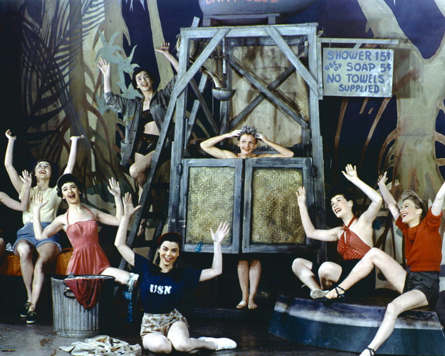 American actress and singer Mary Martin (1913 - 1990) takes a shower in a scene from the Broadway musical 'South Pacific', 1949.