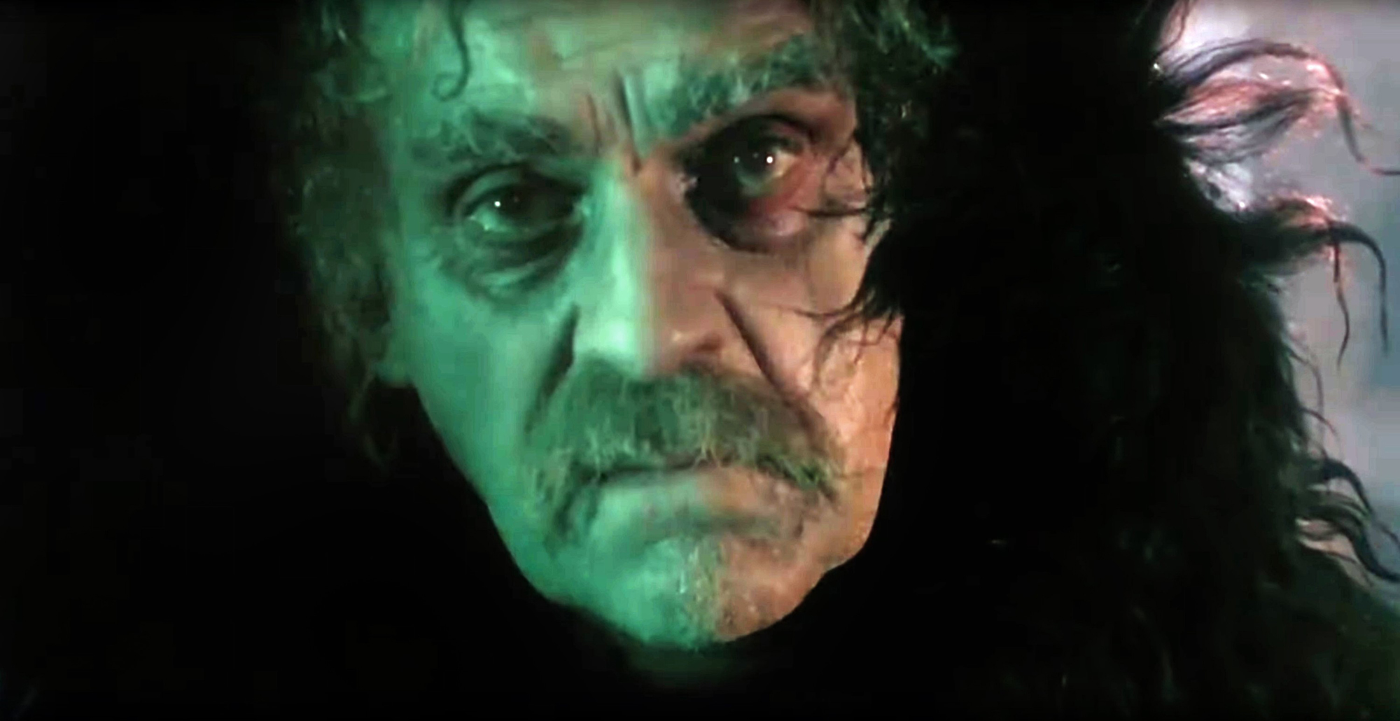 a scene from the 1963 horror film "Black Sabbath." It is an extreme close-up of star Boris Karloff in the anthology film's second story, "The Wurdulak." Karloff, as a Russian grandfather who has been turned into a vampire, has a haggard-looking, mustached face, tinted with a green light. 