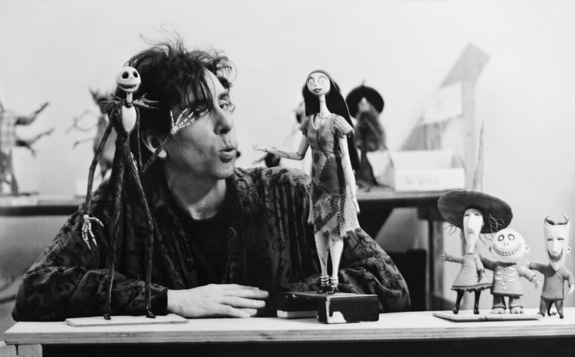 THE NIGHTMARE BEFORE CHRISTMAS, producer Tim Burton with some of the characters, 1993,