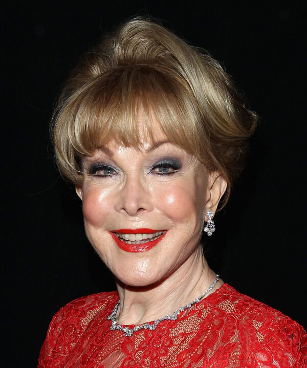 NEW YORK, NY - FEBRUARY 12: Actress Barbara Eden poses backstage at the Go Red For Women Red Dress Collection 2015 presented by Macy's fashion show during Mercedes-Benz Fashion Week Fall 2015 at The Theatre at Lincoln Center on February 12, 2015 in New York City