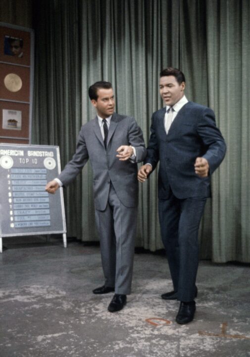 AMERICAN BANDSTAND, from left: Dick Clark, Chubby Checker. Chubby Checker is giving Dick Clark a dance lesson, circa 1961