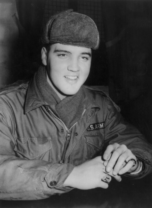 17th December 1958: US rock 'n' roll singer Elvis Presley (1935 - 1977) in military uniform during his stint as a US serviceman at the Grafenwoehr exercise camp, Germany. 