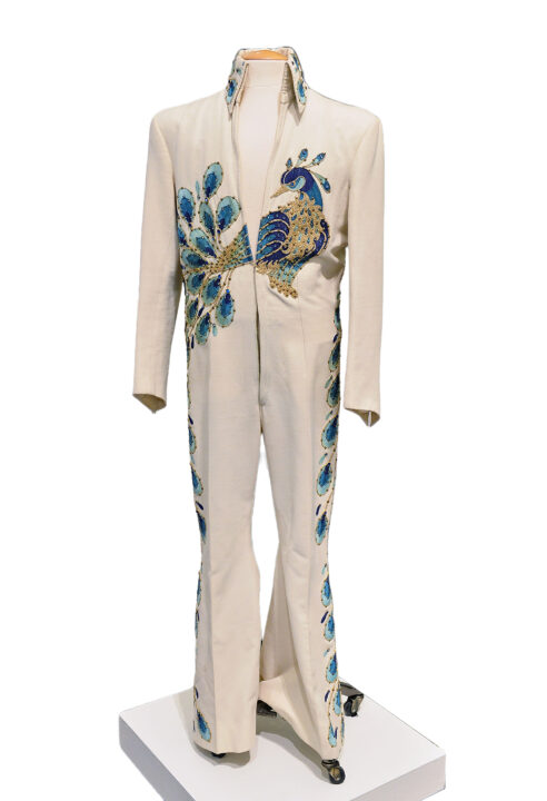 NEW YORK, NY - JUNE 20: Elvis Presley's Peacock Jumpsuit worn during concert apperances in 1974, shown at the press preview "A Rock & Roll History: Presley To Punk" at Sotheby's on June 20, 2014 in New York City. 