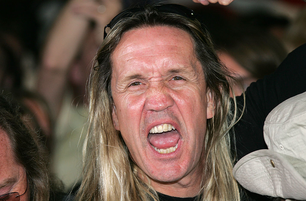 LOS ANGELES - AUGUST 19: Nicko McBrain of Iron Maiden poses for a photograph as he is inducted into Hollywood's Rock Walk, at the Guitar Center on August 19, 2005 in Hollywood, Los Angeles, California