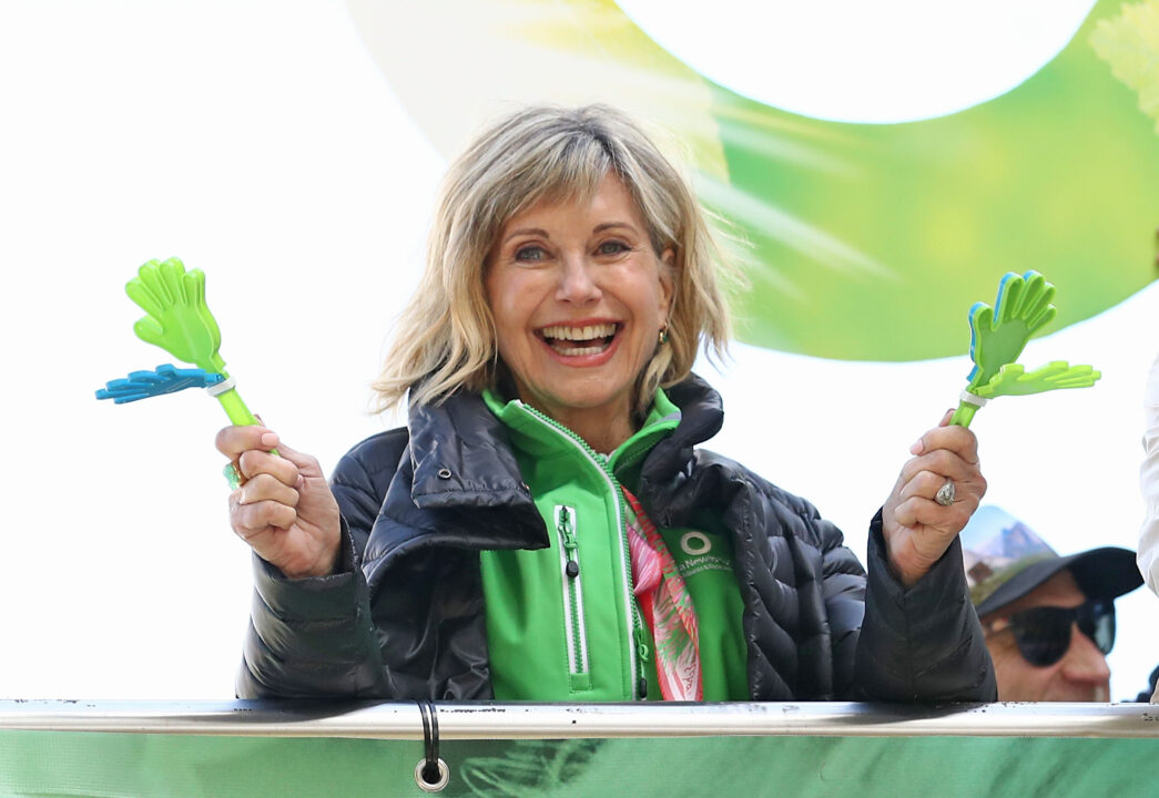 MELBOURNE, AUSTRALIA - SEPTEMBER 16: Olivia Newton-John encourages walkers during the annual Wellness Walk and Research Runon September 16, 2018 in Melbourne, Australia. The annual event, now in it's sixth year, raises vital funds to support cancer research and wellness programs at the Olivia Newton-John Cancer Wellness and Research Centre in Victoria. 