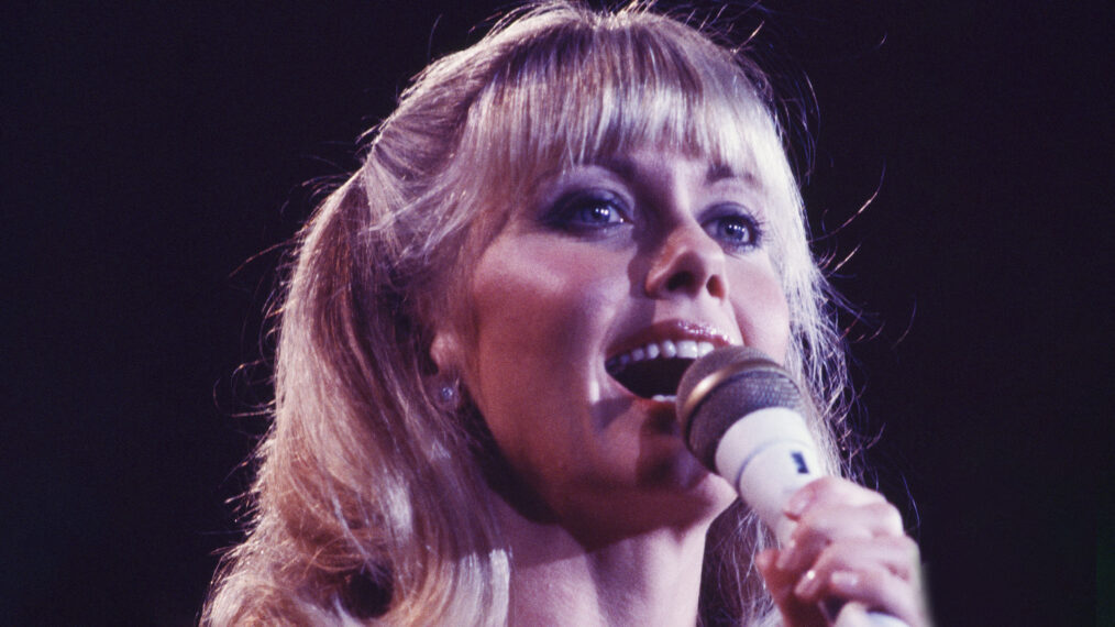 (MANDATORY CREDIT Gutchie Kojima/Shinko Music/Getty Images) Olivia Newton-John performing on stage at the Budokan, Tokyo, Japan, October 1978. She performed there on 17th and 18th.