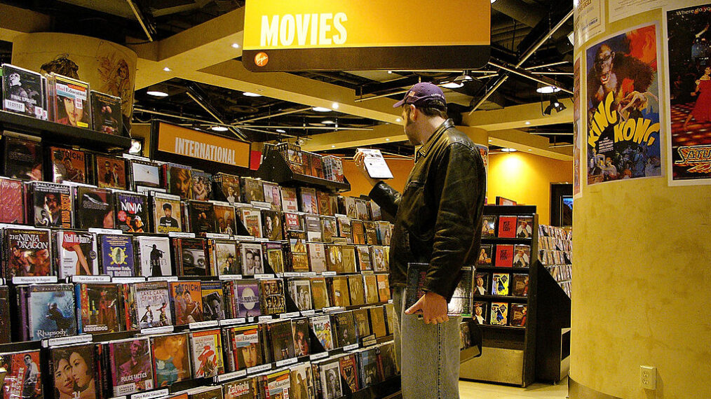 NEW YORK - MAY 25: A man looks at DVD's in a store May 25, 2005 in New York City. According to a report issued this week by the Book Industry Study Group, the U.S. publishing industry continues to put out more books than the public is buying. As more people made a shift toward home video, DVD, Internet and cable, the number of books sold dropped by nearly 44 million between 2003 and 2004, even as the annual number of books published approaches 175,000