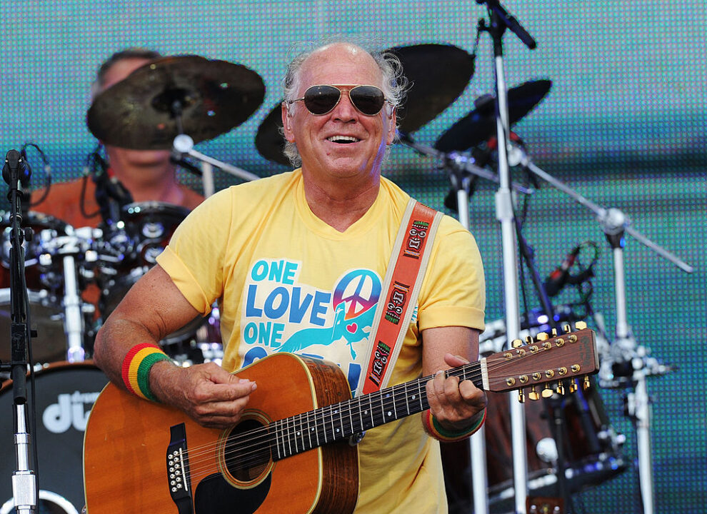GULF SHORES, AL - JULY 11: Musician Jimmy Buffett performs onstage at Jimmy Buffett & Friends: Live from the Gulf Coast, a concert presented by CMT at on the beach on July 11, 2010 in Gulf Shores, Alabama