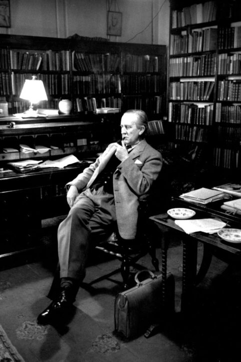 2nd December 1955: British writer John Ronald Reul Tolkien (1892 - 1973), sitting in his study at Merton College, Oxford, where he is a Fellow. Original Publication: Picture Post - 8464 - Professor J R R Tolkien - unpub